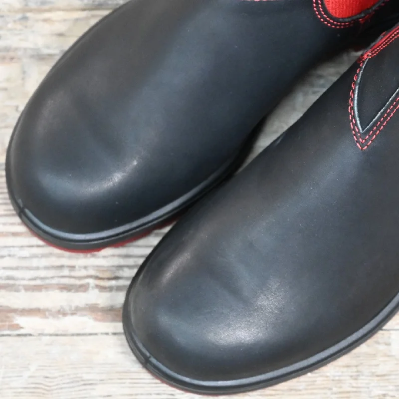 Blundstone Slip On In Black Premium Leather With Red Elastic And Red Outsole.